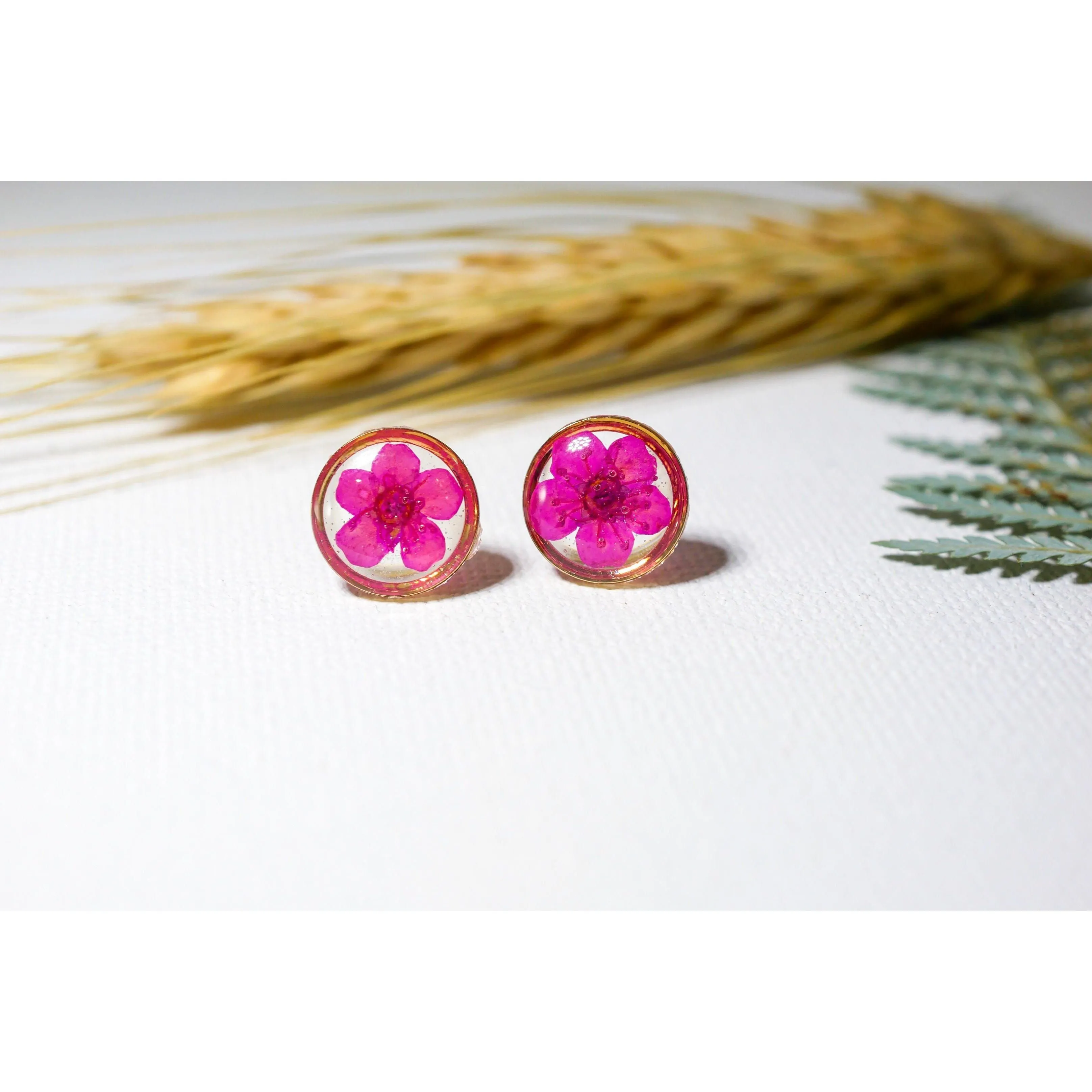 Tiny pink flower studs