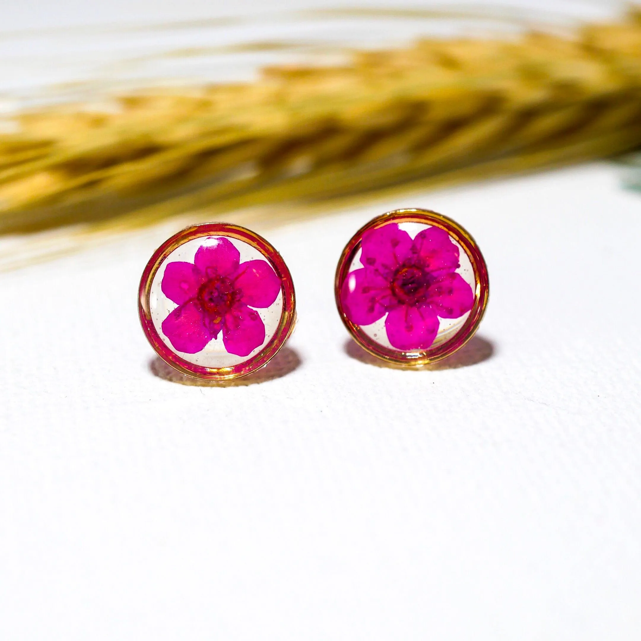 Tiny pink flower studs