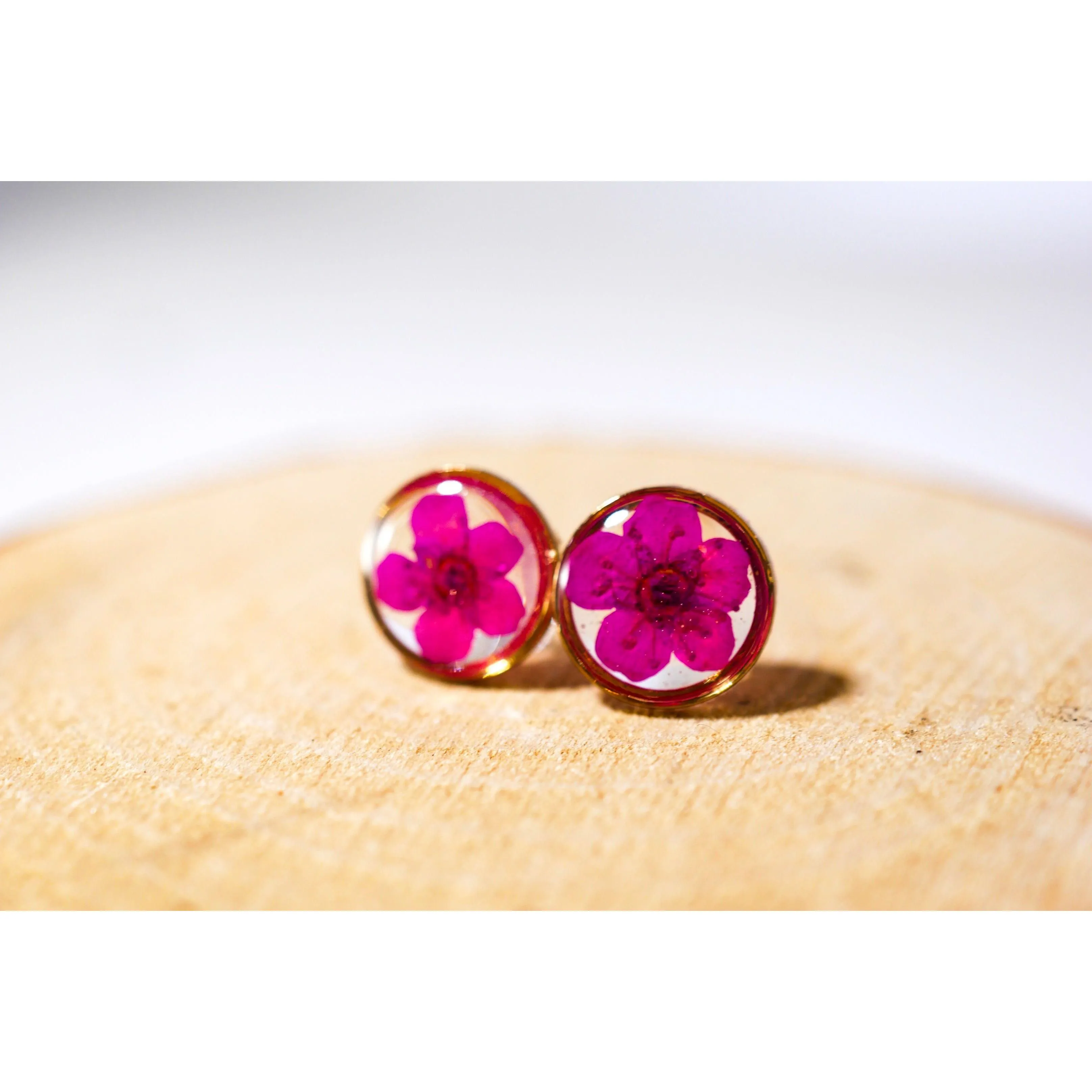 Tiny pink flower studs