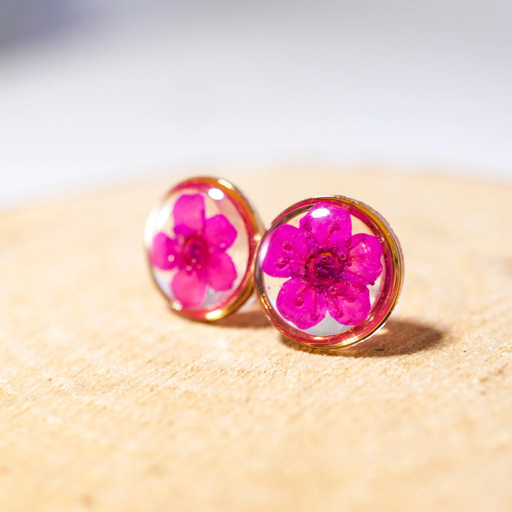 Tiny pink flower studs