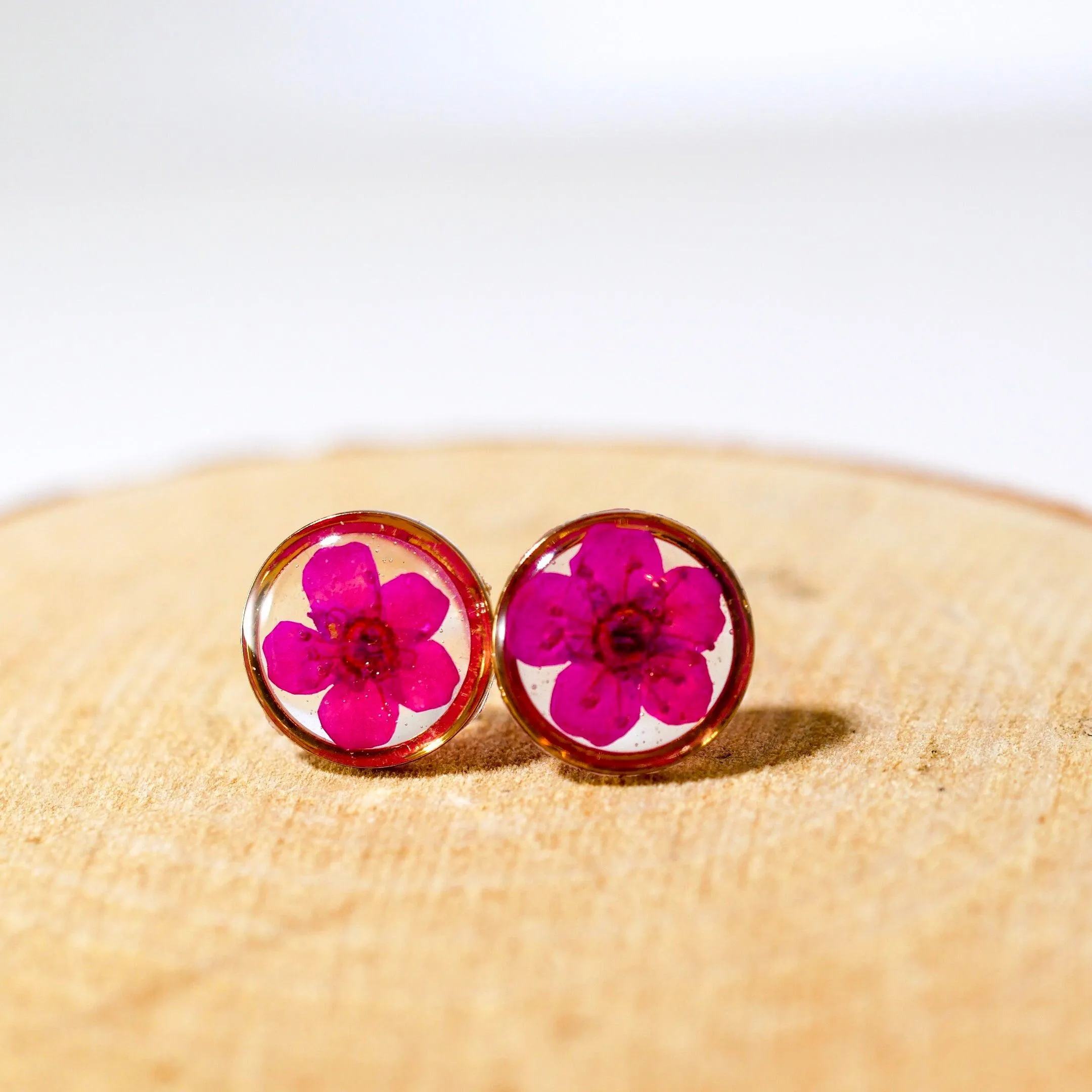 Tiny pink flower studs